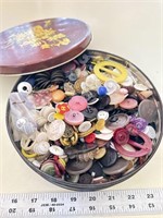 Large tin filled with old buttons and marbles