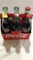 6 pack coke bottle