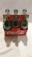 6 pack empty coke bottles