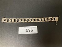 Silver Tone Curb Textured Link Bracelet.