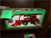 Case IH 150 tractor w/ kemper champion 3000 silage