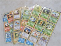 100+ POKEMON CARDS IN SLEEVES