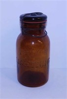 Antique Putnam Lightning amber glass canning jar