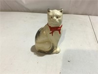 Cast iron ivory kitty cat coin bank w/red bow