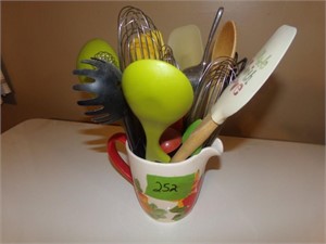 Pitcher of utensils