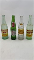 (4) vintage soda bottles (2 RC Cola, 1 Nehi, 1
