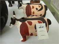 Pair of pottery cows.