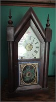 Antique mantle clock with keys. Measures: 19"