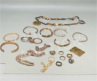 assorted copper bracelets