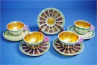 Four Spode coffee cups and saucers