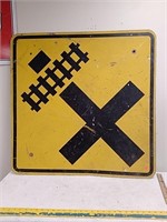 Metal railroad crossing road sign