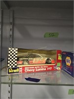 Three NASCAR collectors cars and truck as shown
