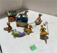 Assorted vintage wind up toys