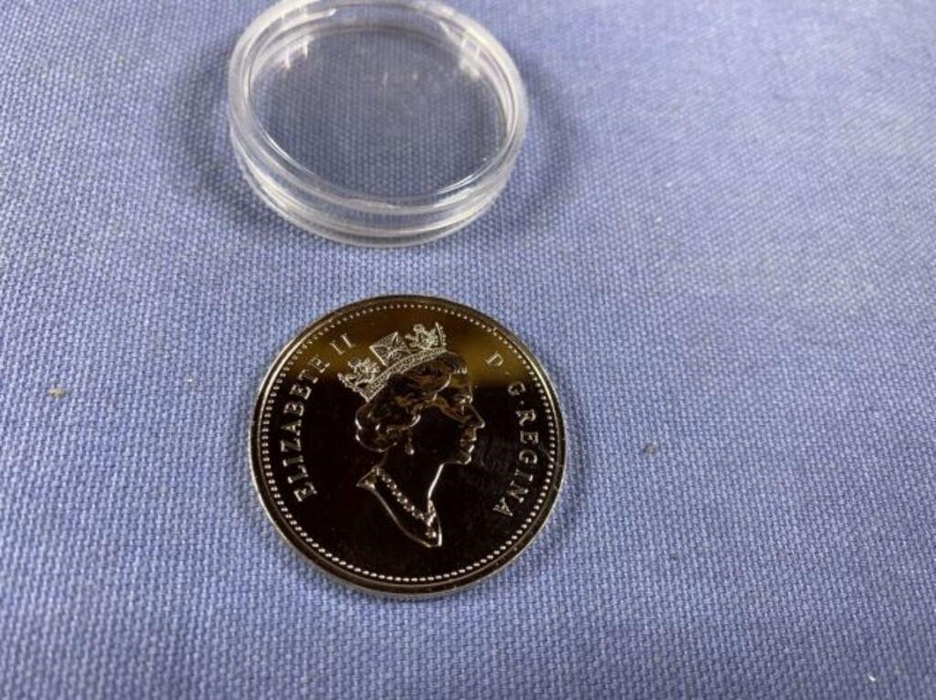 COIN IN PROTECTIVE CONTAINER - CANADA DOLLAR