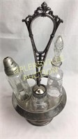 Silverplate Castor set with 3 mismatched bottles