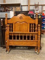 Oak twin bed with rails
