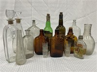 13 whiskey bottles,wine and decanters and shot