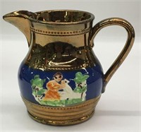 Copper Luster Pitcher With Figural Design