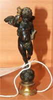 Miniature solid bronze figural cherub desk