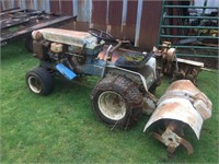 MONTGOMERY WARD GARDEN TRACTOR W/ IMPLEMENTS