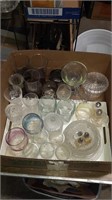 Box of glassware with white serving tray some