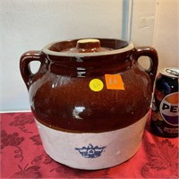 Old brown and white bean pot with handles