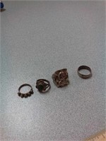 4 costume jewelry rings