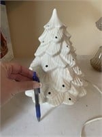 White ceramic Christmas tree with no bulbs