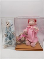 2 Porcelain Head Dolls in case