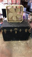 Box fan and large vintage trunk