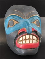 Tlingit mask with artist's mark of  Ivan Otterlift