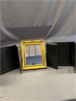 2 picture folios and a mirror