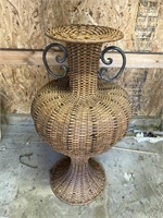 Wicker and metal umbrella holder