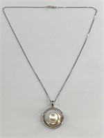 Sterling silver pendant with a freshwater pearl on