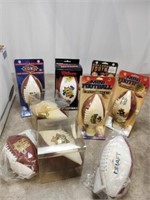 Assortment of Green Bay Packers mini footballs