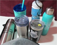 Misc. drink cups with lids.  One Yeti included, on