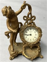 New Haven Clock Co. Figural Brass Shelf Clock
