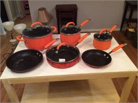 6- Orange pot and pans/ lid set