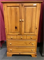 Pine wardrobe with 2 doors over 3 drawers on