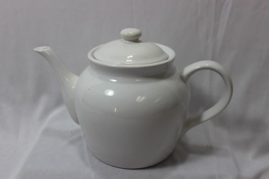 A White Ceramic Teapot