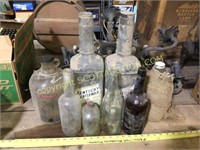8 gallon jugs and whiskey bottles, new washed bad