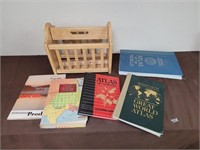 Vintage world atlas books and wood rack