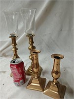 4 Brass candlesticks two are old push,-Up style
