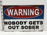 Metal sign- warning nobody gets out sober