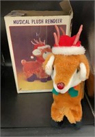 Vintage, musical, plush reindeer