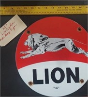 Lion Gasoline gas pump porcelain sign dated 1960