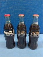 Three Vintage Coca Cola Bottles