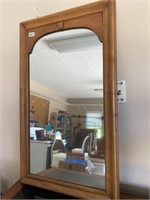 Wall mirror has a film on mirror that might be