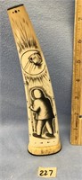 8" fossilized ivory tusk with impressive scrimshaw