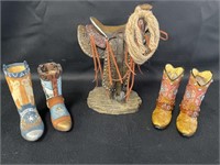 Resin western saddle on post, boots & collector